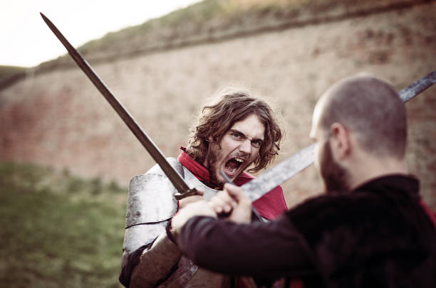 Craiova, Dolj County, Romania – May 14, 2022:  Fighters in authentic historical clothing at the medieval festival Michael le Brave ( Mihai Viteazul ). Reconstruction of a medieval battle.