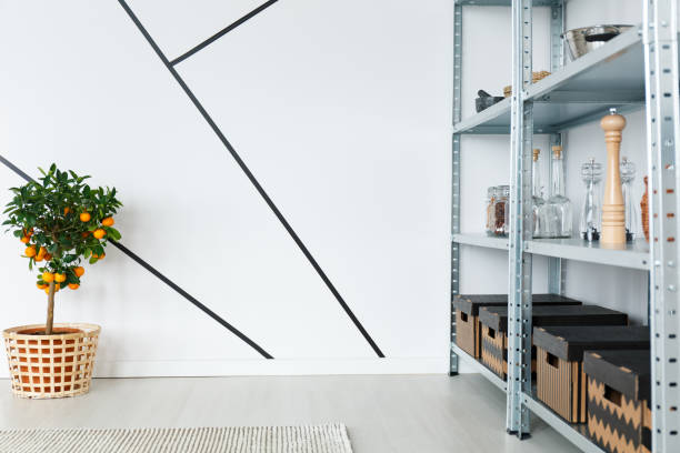 istock Metal shelf in room 695845530
