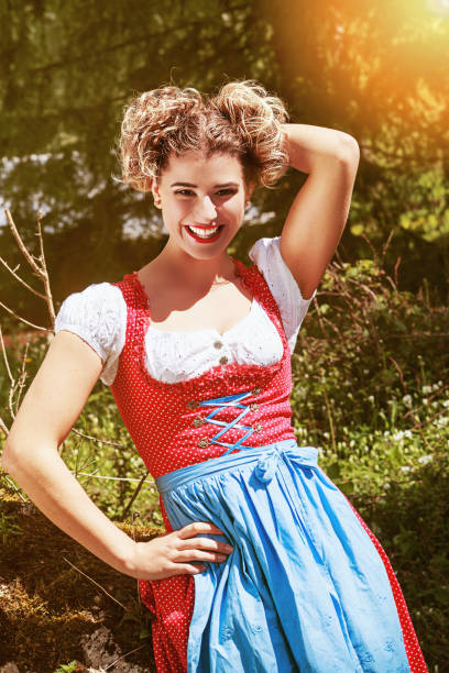 Cheerful young woman in dirndl