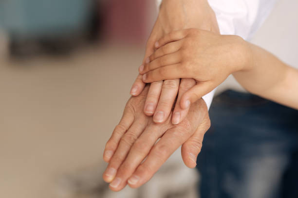 istock Beautiful female hands being put on each other 695847398
