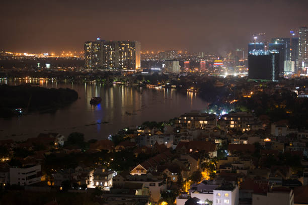 istock Ho Chi Minh City with Mekong river at night 695854532