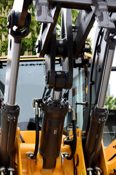 istock Hydraulic mechanism for erecting ripper on the bulldozer 695855304