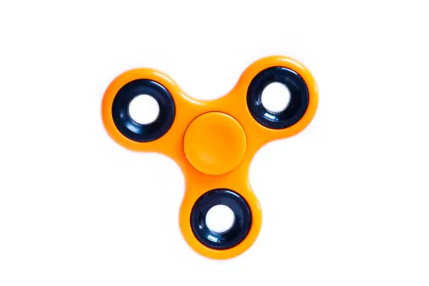 Photo of Hand spinner. A fidget toy for increased focus, stress relief.