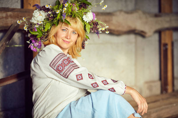 istock Beautiful Ukrainian woman in a barn 695866268