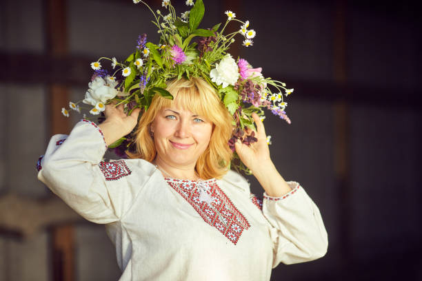 istock Beautiful Ukrainian woman in a barn 695866280