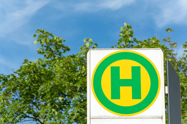 istock German bus stop sign close up in the sun 695867076