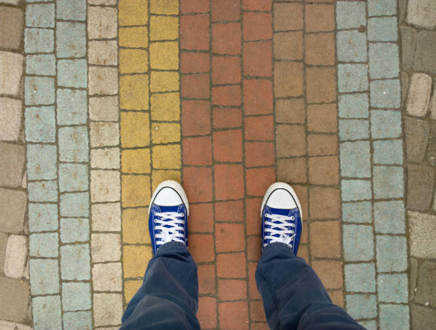 istock Feet on the cobblestone. 695869276