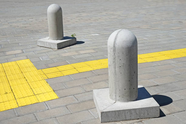 istock Concrete bollards on the sidewalk 695869432