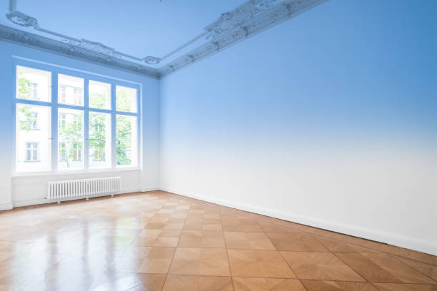 istock empty room, wooden floor in new apartment 695869846