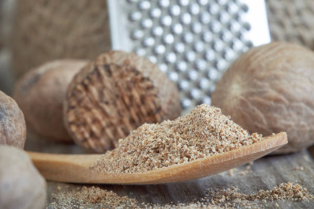 istock Group of nutmeg seeds 695877494