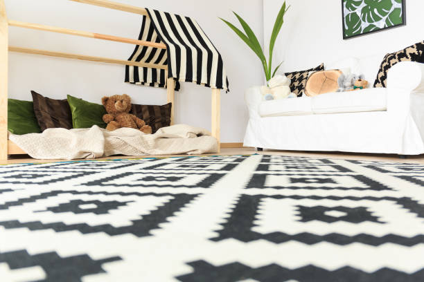 istock Monochrome carpet in kids playroom 695880112