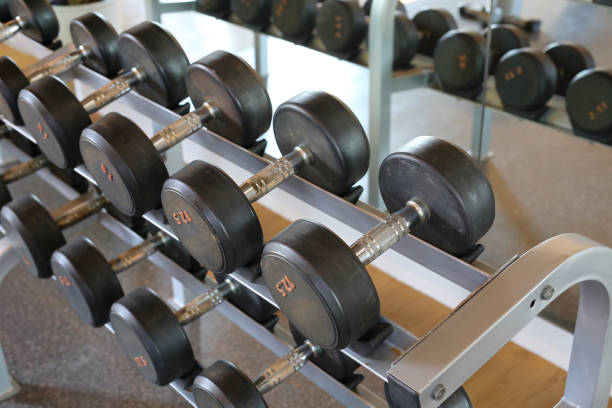 istock Closeup of dumbbells in gym. 695881372