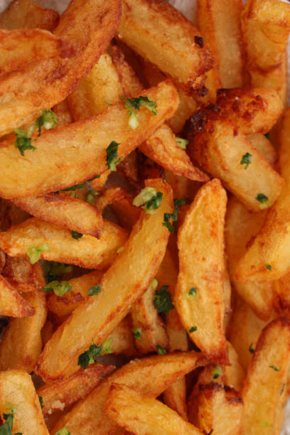 istock Fried potatoes - Garlic and parsley chopped 695888032