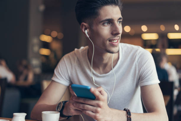 istock Listening to music 695888748