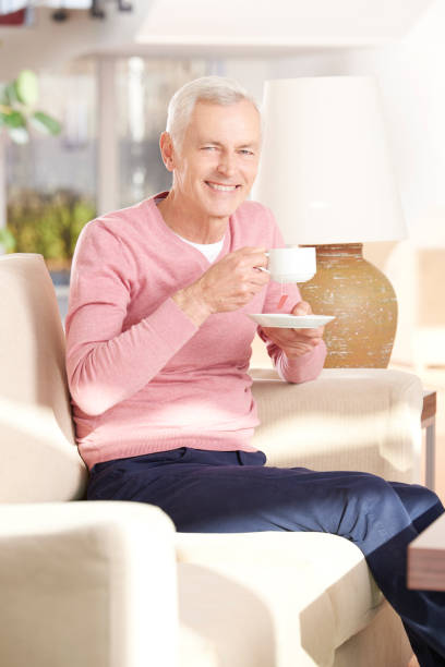 istock Senior man relaxing at home 695894510