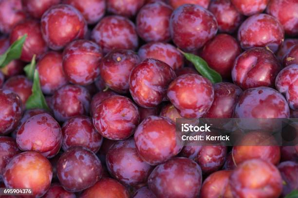 Plum Fruits On Market Stock Photo - Download Image Now - Plum, Red, Market - Retail Space
