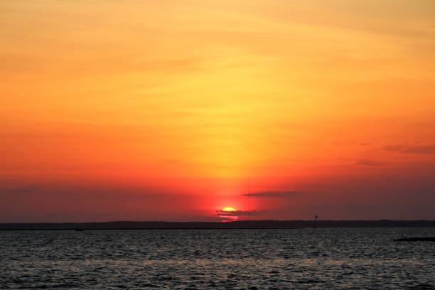 istock Sunset over the Bay Long Beach Island 695904572
