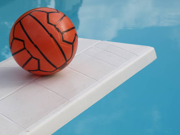 istock Swimming pool with balloon on the diving stage 695907352
