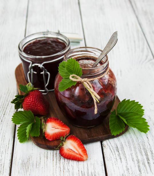 istock Strawberry jam and fresh strawberries 695907446
