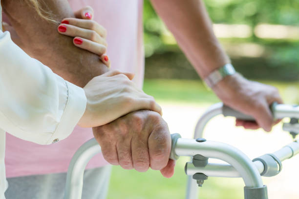 Elderly man leaned on the walking frame Closer shot of elder man's hands leaned on the walking frame united states senate committee on health education labor and pensions stock pictures, royalty-free photos & images