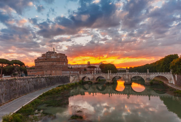 istock Saint Angel castle and bridge at sunrise, Rome 695915584