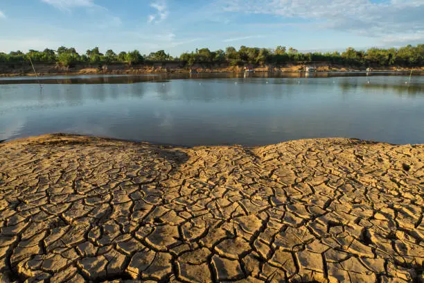 Photo of Cracked Earth Because the ground has been no rain on the land