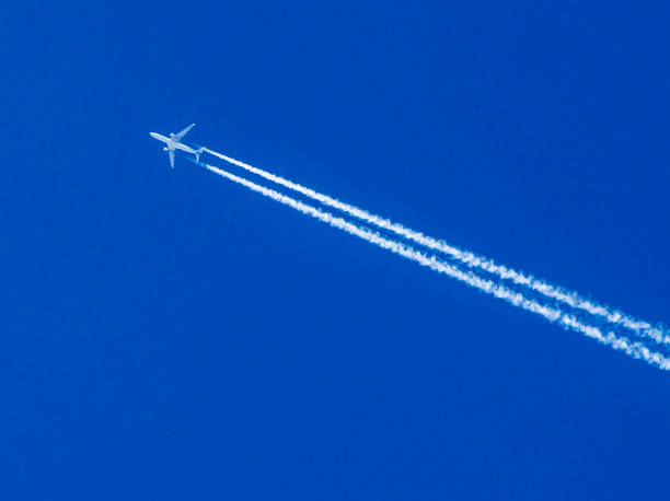 istock Airplane Vapor Trail 695916756