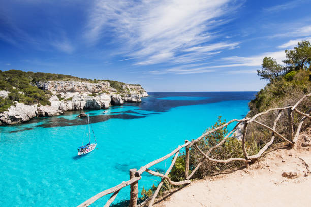 Beautiful bay in Mediterranean sea Beautiful bay with sailing boats, Menorca island, Spain aegean sea photos stock pictures, royalty-free photos & images