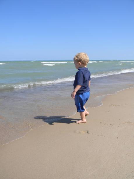 istock Little Boy, Big Lake 695920786