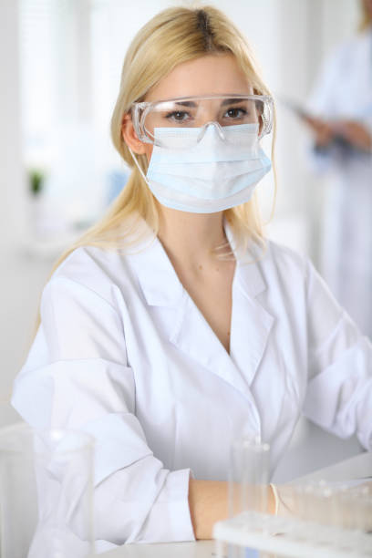 istock Female scientific researcher in laboratory 695920890