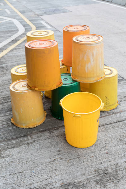 istock Yellow Buckets at Street 695923890