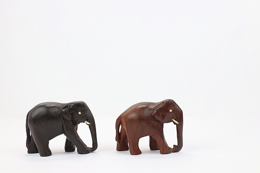 Hand carved wooden elephant figurines