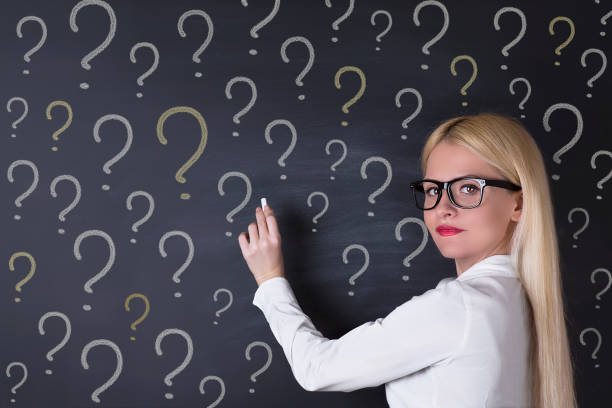 istock Business woman and questions 695936686