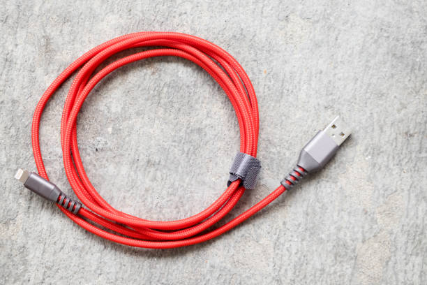 istock Red USB cable connector for charger smartphone 695940312