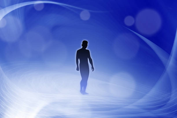 conceptual image of abstract structural light manipulation and silhouetted man
