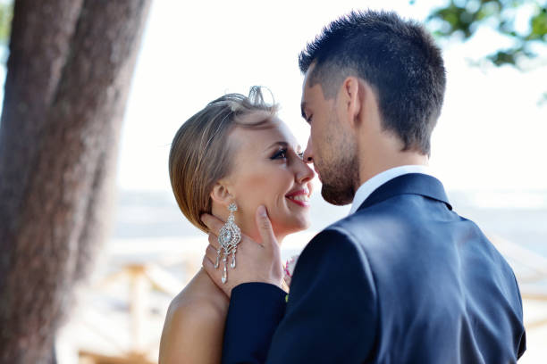 istock Wedding couple on the nature is hugging each other 695946882