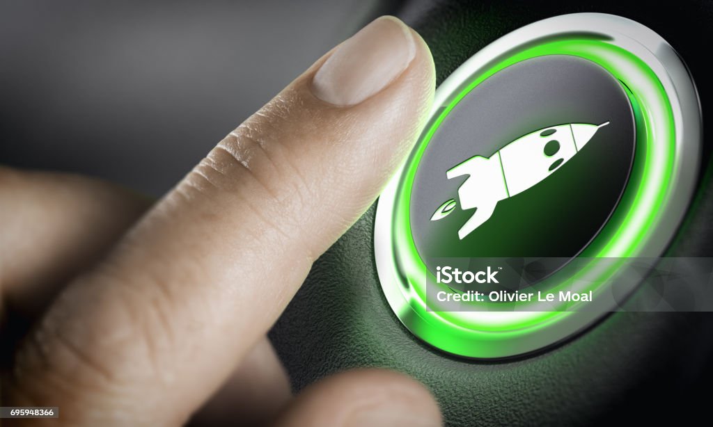 Career Accelerator, Boost Button Man finger pressing an boost button with a rocket icon, black background and green light. Composite between a photography and a 3D background. Start-up concept. Speed Stock Photo