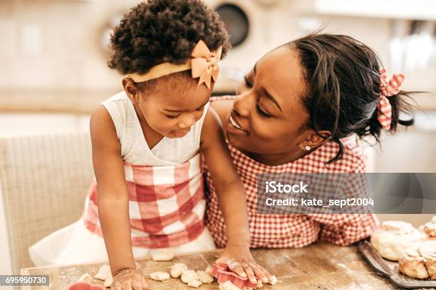 Mom And Toddler Baking Together Stock Photo - Download Image Now - Family, New Year, Baking