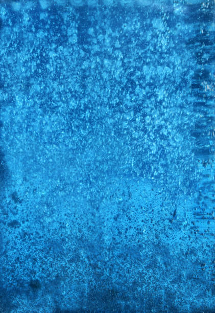 istock Water and air bubbles over abstract blue background. 695950846