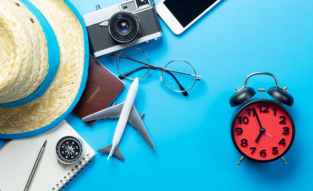 istock Summer travel time with accessories and alarm clock 695951762