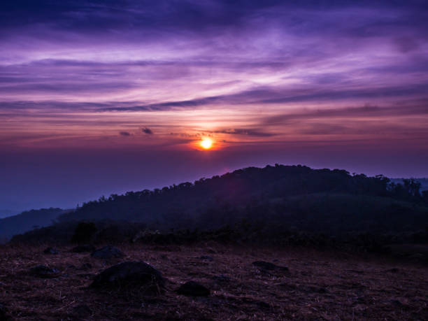 istock The sun rises between the cloud and mountainn in Mon Jong. 695962032