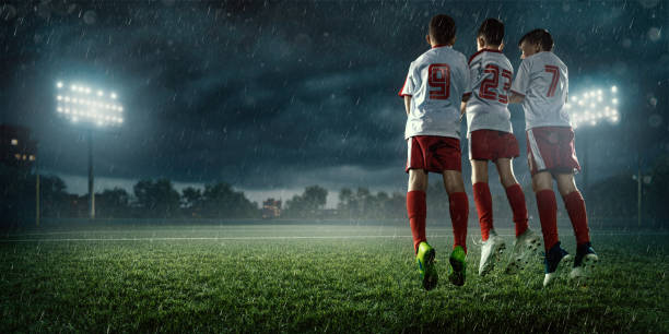 istock Soccer kids player makes a free kick 695970178