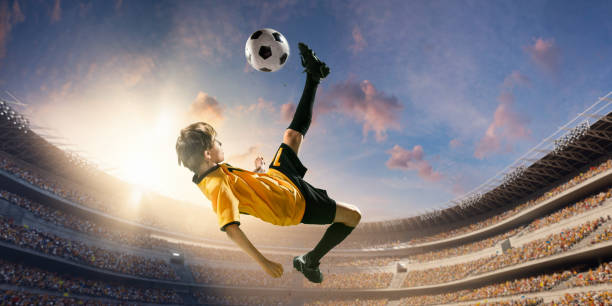 istock Soccer kids player in action in 3D dramatic stadium 695970596