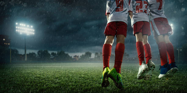 istock Soccer kids player makes a free kick 695970598