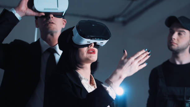istock Architects and designers in VR headsets on the site 695971214
