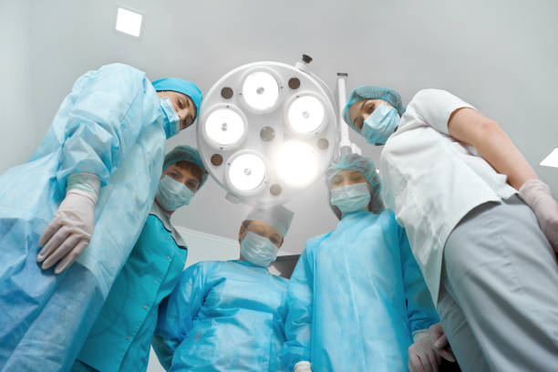 Team of professional surgeons posing together
