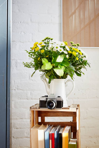 istock flowers in pitcher vivid light vintage decoration 695982508