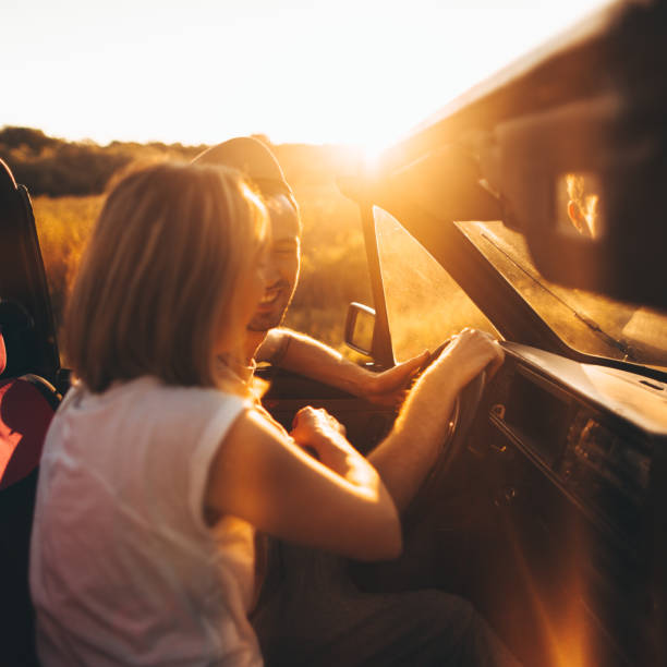 istock Young couple on the road trip 695984334