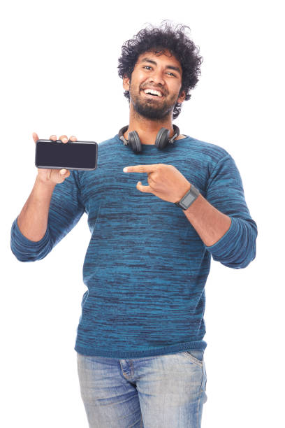 istock Cheerful young man showing latest smart phone 695987670