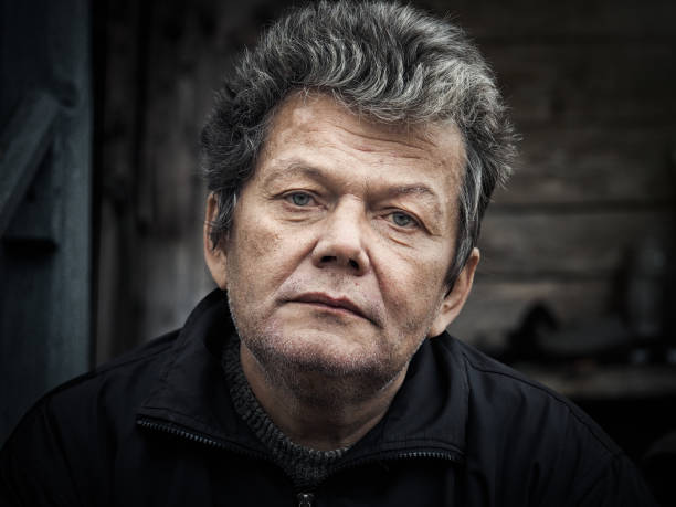 istock Sad middle-aged man with wrinkles on his face. Portrait 695991278